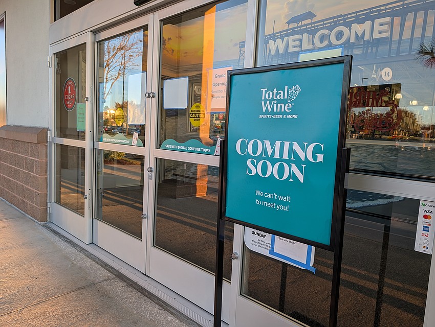 Total Wine & More in River City Marketplace says it will open Nov. 13.