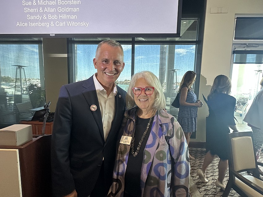 Democratic Gov. candidate David Jolly poses for a photo with Longboat Key Democratic Club President Lucie Lapovsky at the Sarasota Yacht Club Nov. 4.
