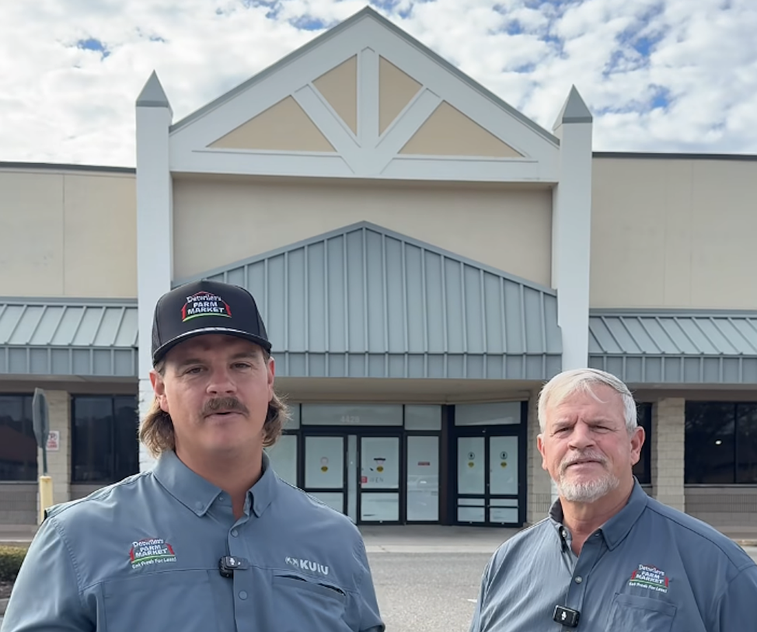 Detwiler's Farm Market President Sam Detwiler and CEO Henry Detwiler Sr. stand in front of what will become the seventh store for the grocer.