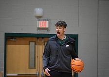 Kaden Knott challenges his players during a practice-opening hustle drill. The first-year coach is tasked with leading the Mustangs to their first winning season since 2021-22.