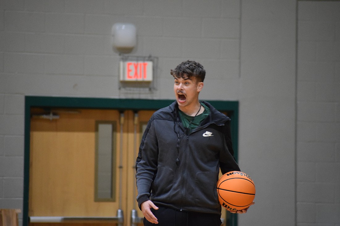 Kaden Knott challenges his players during a practice-opening hustle drill. The first-year coach is tasked with leading the Mustangs to their first winning season since 2021-22.
