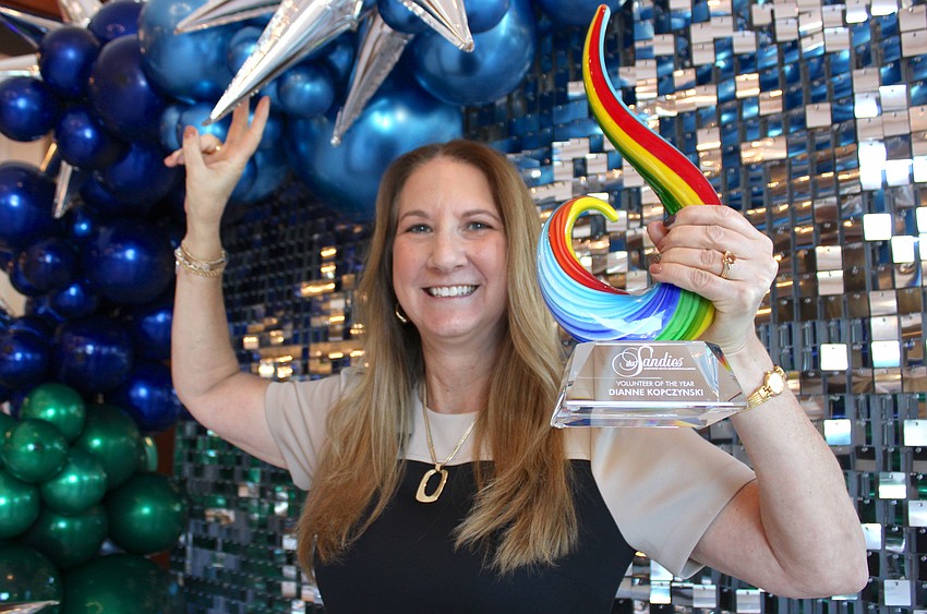 Dianne Kopczynski of Mauldin and Jenkins, LLC, received perhaps the biggest award of The Sandies when she earned the Volunteer of the Year award from the Lakewood Ranch Business Alliance Nov. 14 at the Grove.