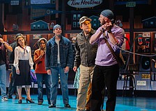 Anxious travelers are desperate to contact loved ones after they are stranded in Gander, Newfoundland, in Asolo Rep's production of "Come From Away."
