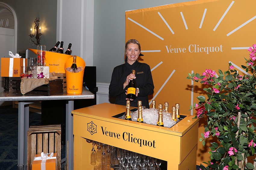Barb-Nicole Ponsardin transformed her family's champagne business after her husband François Clicquot died in 1805. Ritz Carlton's Tonya Frye serves Veuve Clicquot, also known as 'The Widow Clicquot'.