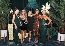 Keep calm and party on: Co-Chairs Renee Phinney, Lauren Dixon, Lauren Wohlwend and Allison Imre along with event planner Minta Getzen (center) make sure that every detail of Wine, Women & Shoes is handled with the utmost care.
