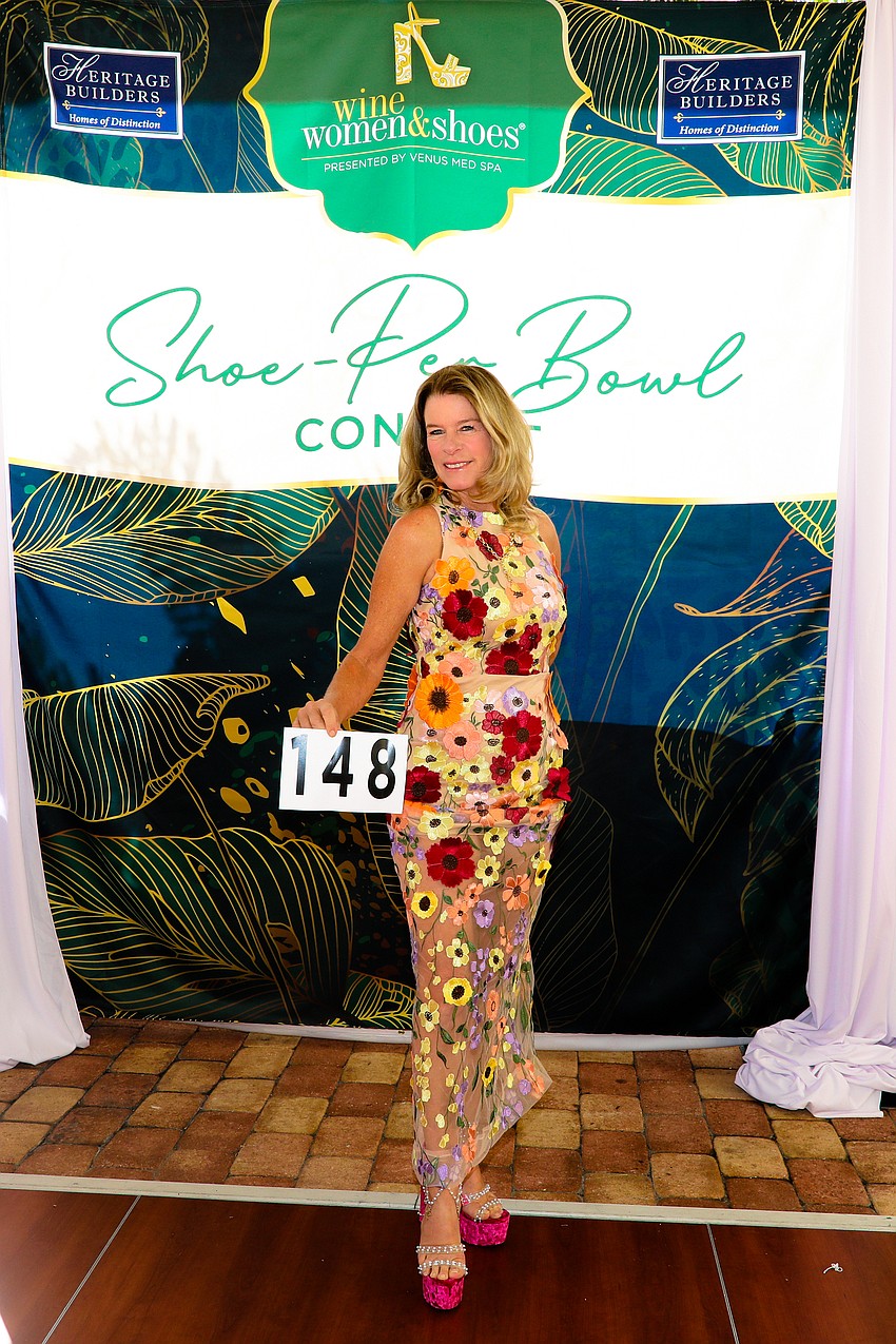 Elizabeth Moore enters the Shoe-Per-Bowl competition with her pink platform and pearl kicks.