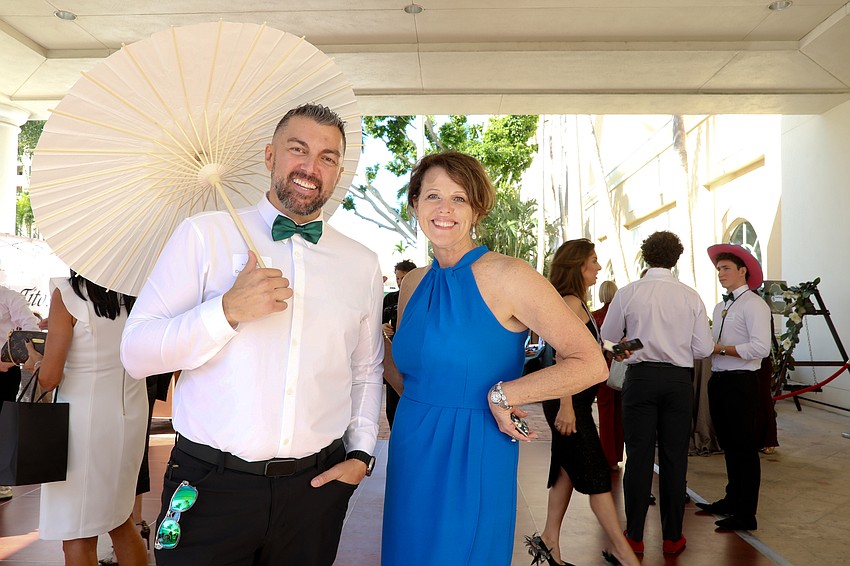 David Perkowski and his parasol with Lynn Proulx.
