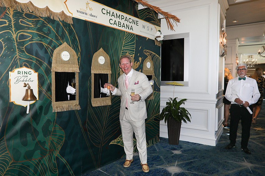 Paul Allen rang for bubbles at the champagne cabana live-vend.