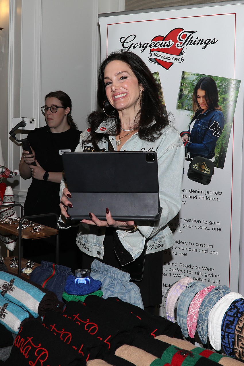 Sara Peterson rings up a sale at her pop-up boutique.