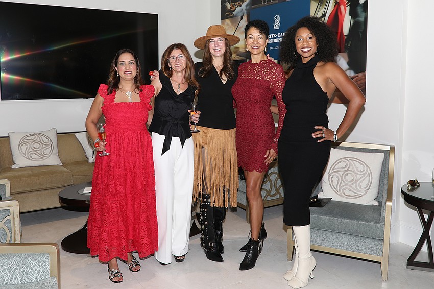 Puja Dhanraj, Julie Hagen, Anna Nekoranez, Shellye Archambeau and Kethlyn White enjoy the VIP lounge.
