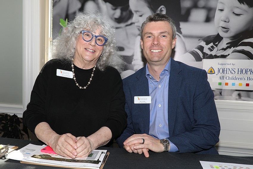 Forty Carrots Family Center Donor Relations Manager Geri Jo Manson and board chair Ben Jones are all smiles as they greet over 400 guests.