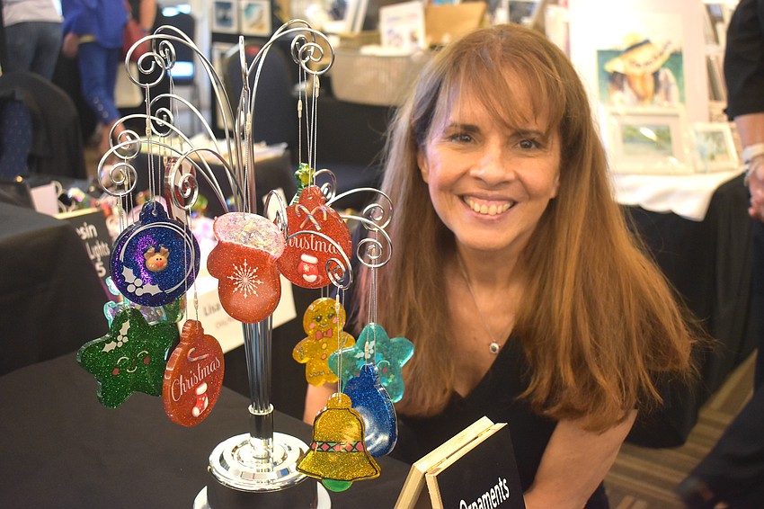 Lisa Sweeney of Artwork by Lisa gets festive with her Christmas themed resin ornaments.