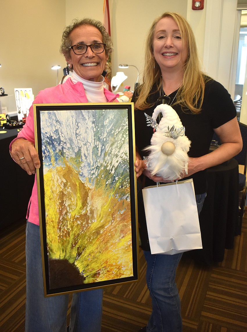Palmetto's Micki Gaughan and Laurie Gerstein couldn't leave the sale without purchasing pieces from Patty Notarianni and Linda McMillan.