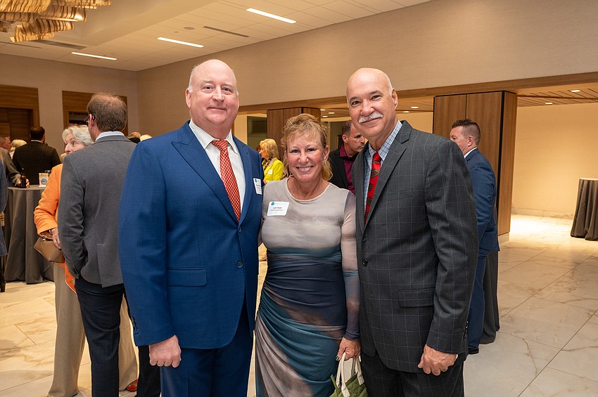 Drayton Saunders with Leah and Nate Yoder