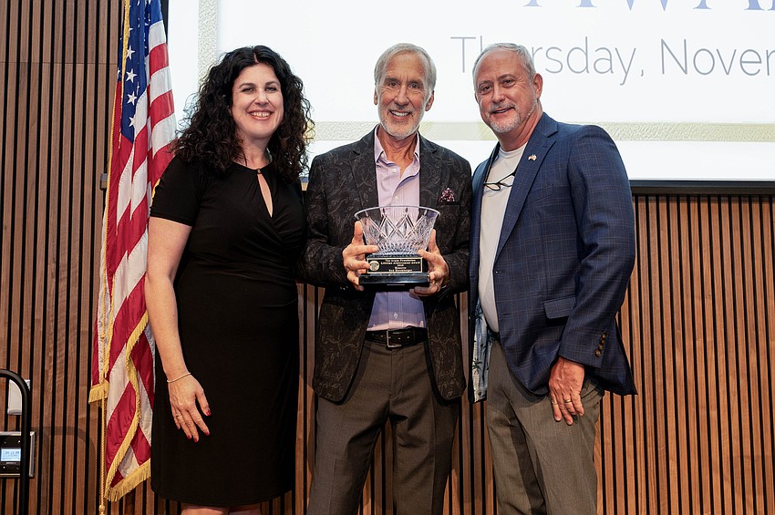 Argus Foundation Executive Director Christine Robinson, Honoree Rod Hershberger and Argus Board President Todd Morton