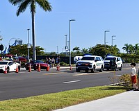 Sarasota County Sheriff's Office deputies are stationed at the exit of Cars and Coffee Nov. 8.