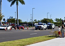 Sarasota County Sheriff's Office deputies are stationed at the exit of Cars and Coffee Nov. 8.