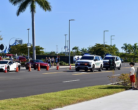 Sarasota County Sheriff's Office deputies are stationed at the exit of Cars and Coffee Nov. 8.