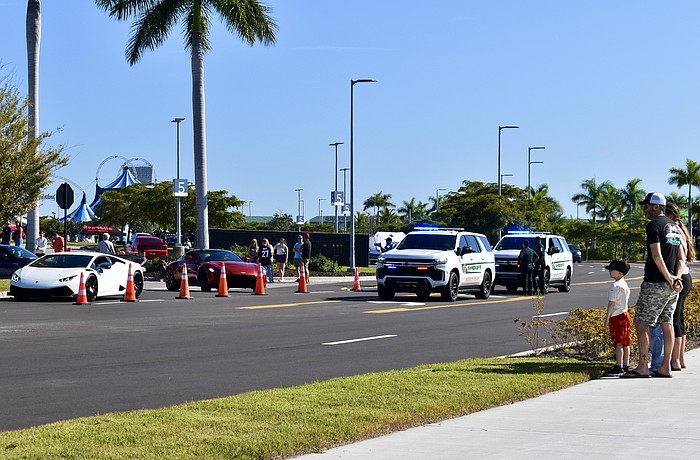 Sarasota County Sheriff's Office deputies are stationed at the exit of Cars and Coffee Nov. 8.