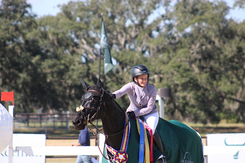 Virginia's Marley Stone Bourke takes a victory lap aboard First Obama after securing the CCI3 title at The Event at TerraNova Nov. 16 in Myakka.