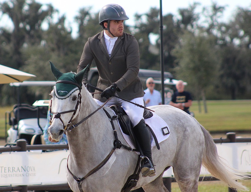 Pennsylvania's Braden Speck checks his score after finishing aboard BSF Liam. He placed eighth.