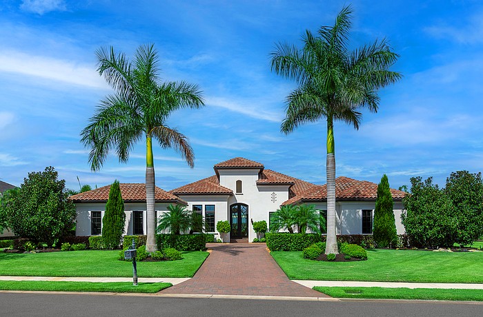 This Lake View Estates at Lake Club home at 14831 Como
Circle ​sold for $3,725,000. Built in 2019, it has four bedrooms, three-and-a-half baths, a pool and 4,096 square feet of living area.