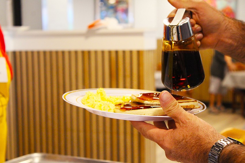 Both the syrup and the contributions were flowing at the Nov. 15 pancake breakfast fundraiser organized by the Kiwanis Club of Longboat Key.