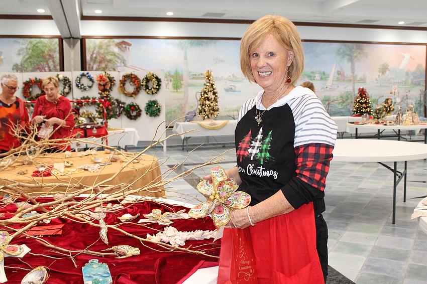 Susan DiNatale supported the Christmas bazaar at St. Mary, Star of the Sea, Catholic Church with her hand-painted seashell decorations.