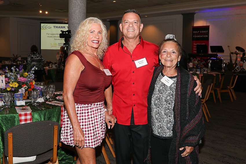 Nita Roberts, Alexander Menkes and Heidi Gurbarg enjoy attending this event together each year.