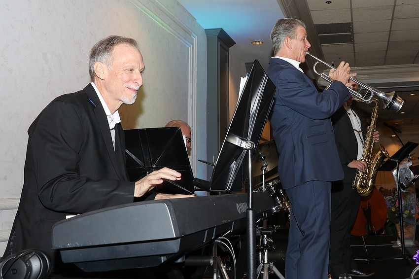 Anthony Mongillo on keys and Victor Mongillo on trumpet perform with the John Miller Jazz Ensemble.