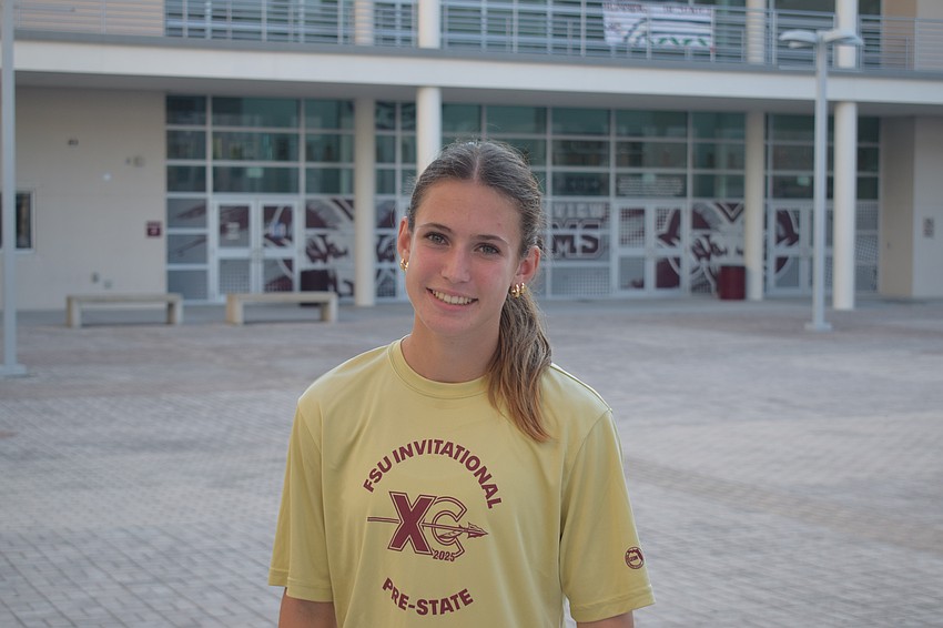 Madison Muller poses for a photo after a Nov. 17 practice at Riverview High School. The record-breaking sophomore will lead the Rams into the FHSAA Class 4A girls' cross country state championship.