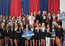 The Riverview boys/girls and Sarasota boys pose for a photo with their medals and trophies on Nov. 14 at Florida Aquatics Swimming and Training in Ocala. Both programs dominated at the FHSAA Class 4A state championships.