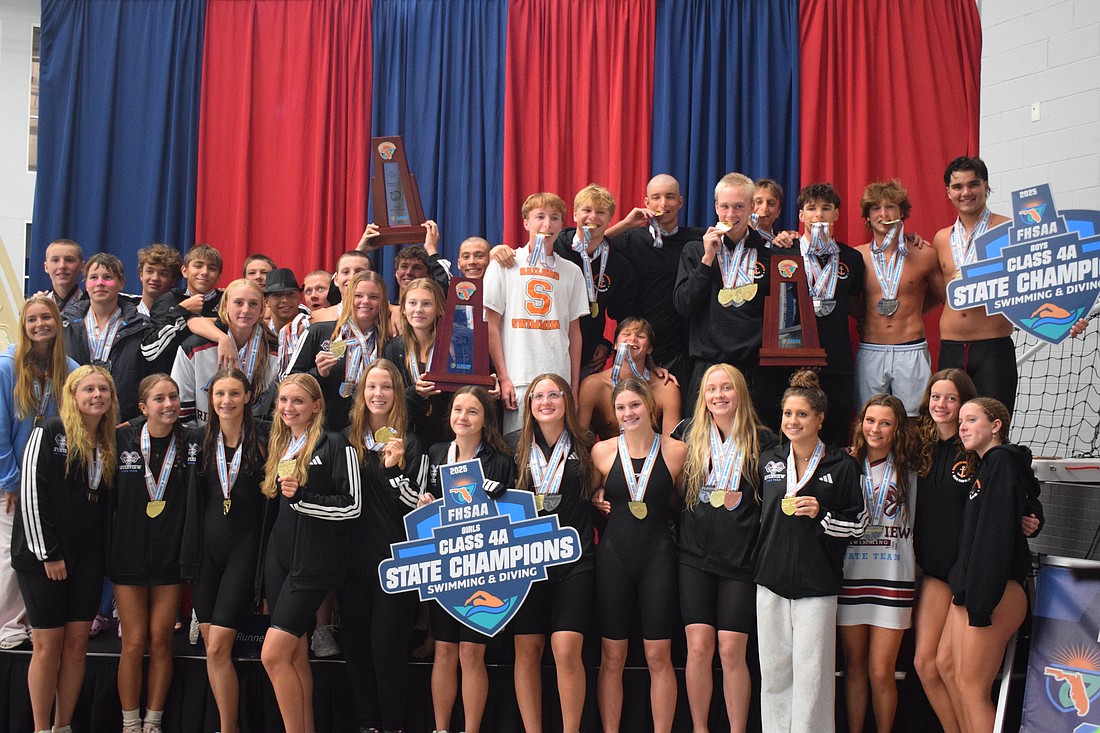 The Riverview boys/girls and Sarasota boys pose for a photo with their medals and trophies on Nov. 14 at Florida Aquatics Swimming and Training in Ocala. Both programs dominated at the FHSAA Class 4A state championships.