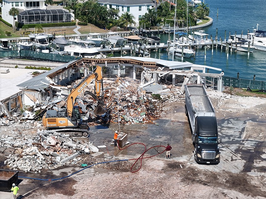 Bird Key Yacht Club member Michael Hunter captures the demolition of the old clubhouse at 301 Bird Key Drive.