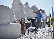 Artists including Isabelle Gasse (front) compete during the festival.