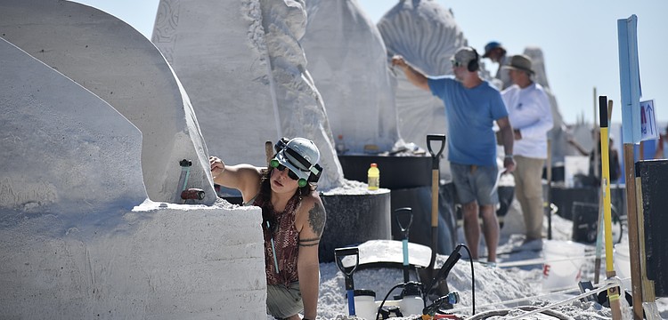 Artists including Isabelle Gasse (front) compete during the festival.