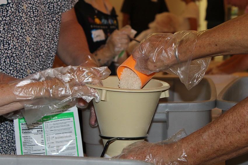 About 120 volunteers lent a hand packing meals for Kids Against Hunger through St. Armands Key Lutheran Church.