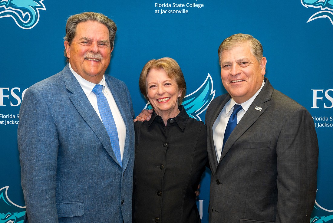 From Left, Michael Ward, Jennifer Glock and Florida State College at Jacksonville President John Avendano.