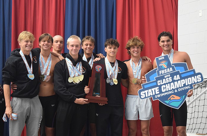 Sarasota boys' swimming poses for a photo on Nov. 14 at Florida Aquatics Swimming and Training in Ocala after winning the title. From left: Cy Matteson, Jackson Irwin, Adam Malaj, Bogdan Zverev, Daniil Siutsou, Daniel Keegan, Jack Sallee and Andrew Malaj (Charles Shoemaker not pictured).
