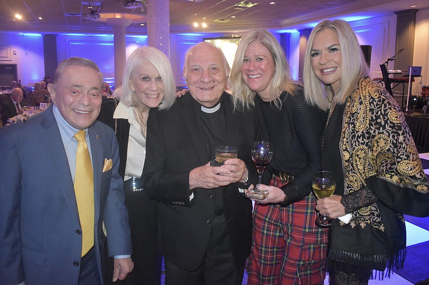 John DeStafano, Carol Angelotti, Rev. Fausto Stampiglia, Kim McLeod and Lynn Yunis