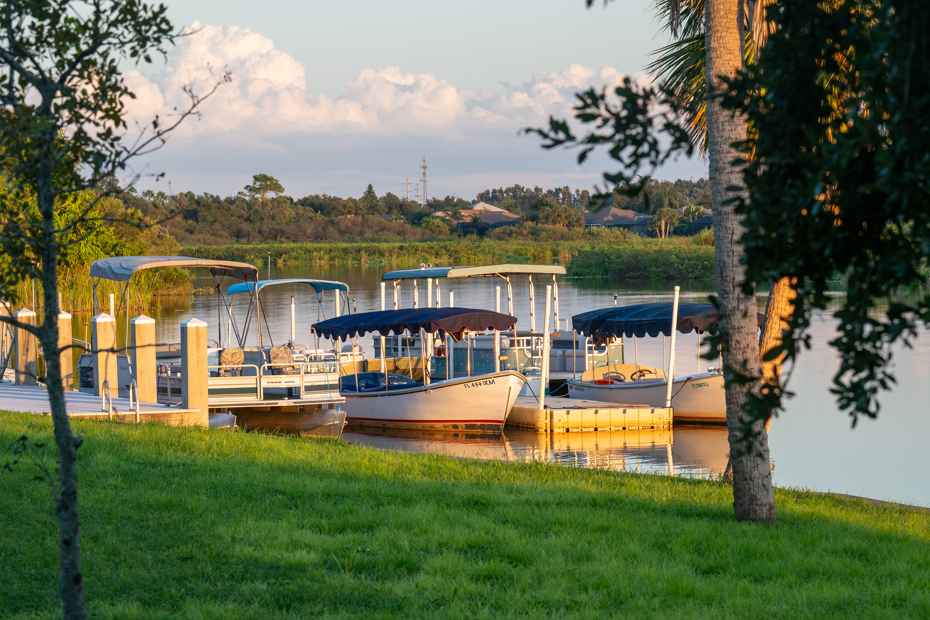 Pontoon boats line the dock at day’s end, ready for another round of fishing, eco-tours and sunset cruises on the Braden River.