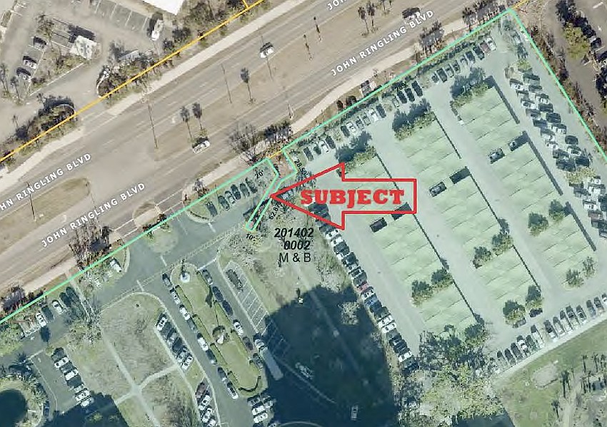 The outlined area illustrates the 650-square-foot parcel owned by the city that encroaches into Plymouth Harbor's campus on Coon Key.