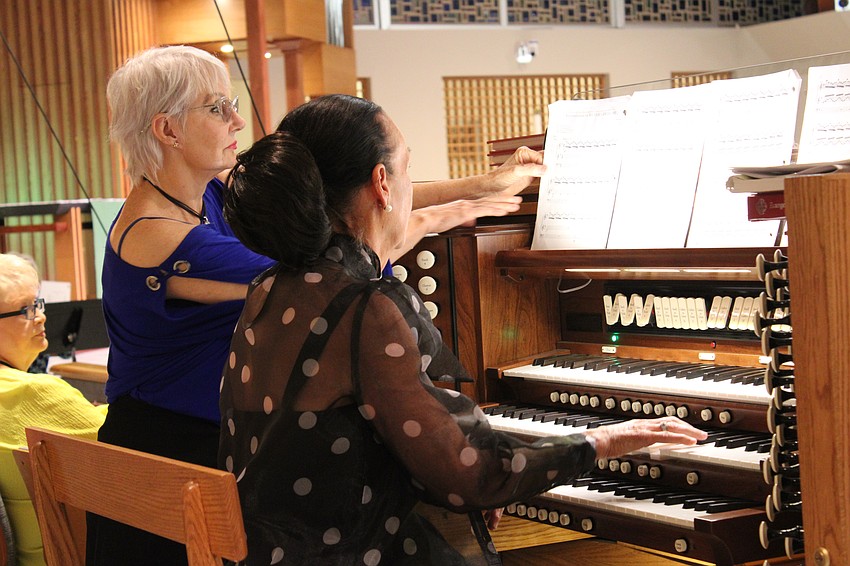 Temple Beth Israel's Music Director and Organist Ann Stephenson-Moe and Choir Soloist Kei Sulhi close out the program at the 45th annual interfaith Thanksgiving service on Nov. 18 at St. Armands Key Lutheran Church.