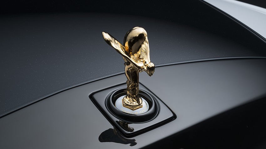 The Spirit of Ecstasy sculpture is featured on the hood of Rolls-Royce cars was 