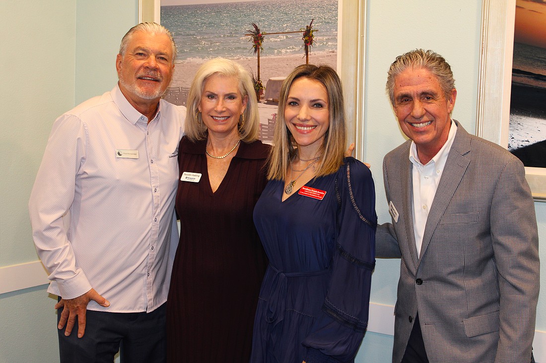 Organizers of this year's Lawn Party by the Bay eagerly anticipate the foodie festival, which will feature more restaurants than ever before. From left, The Resort at Longboat Key Club Managing Director Rick Konsavage, Kiwanis Club of Longboat Key President Danielle Gladding, Children's Guardian Fund Executive Director Svetlana Ivashchenko and Kiwanis Club Past President Michael Garey.