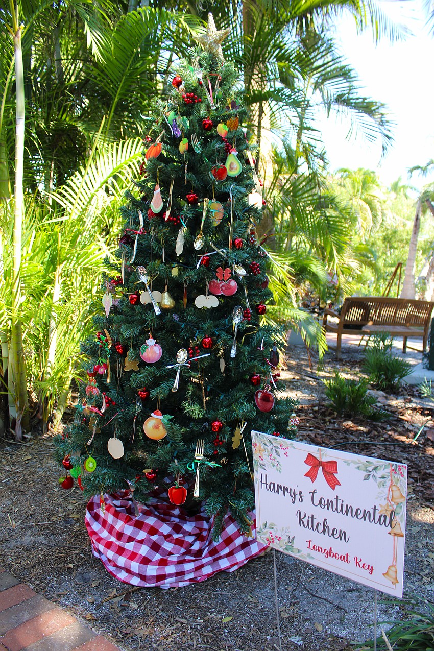 Harry's Continental Kitchen shows off its culinary craftiness with a brightly decorated tree included in this year's Christmas in the Garden, which starts Nov. 30.
