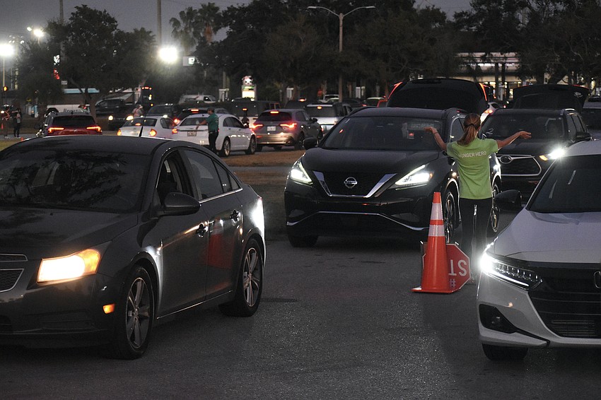 Kamila Brannan directs traffic.