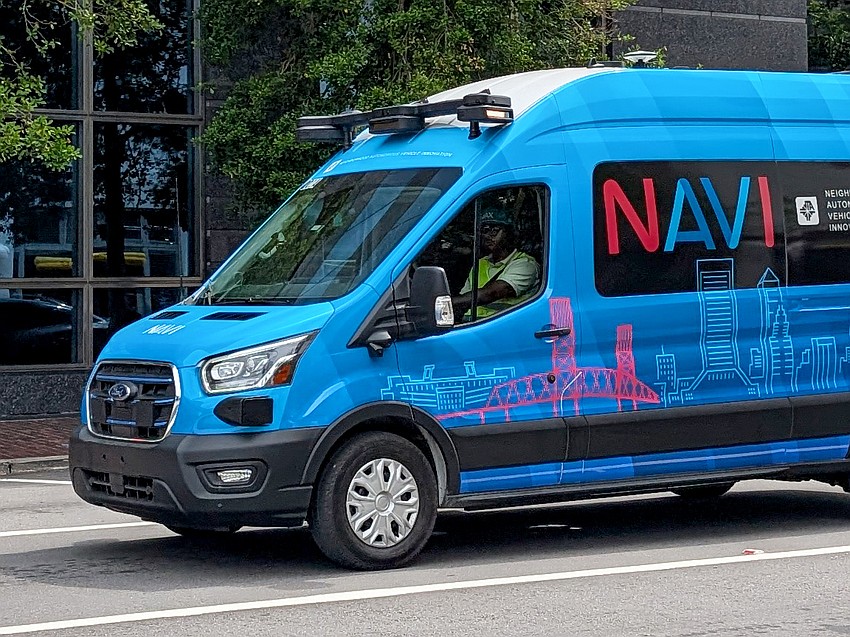 The Jacksonville Transportation Authority's driverless NAVI vans have an attendant that sits behind the wheel.