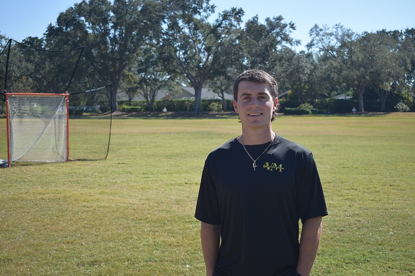 Vinny Mercadante poses for a photo at Summerfield Community Park. In addition to running VM Lacrosse Training, he is the offensive coordinator and faceoff coach for Tampa men's club lacrosse, which competes in Division II of the Men's Collegiate Lacrosse Association.