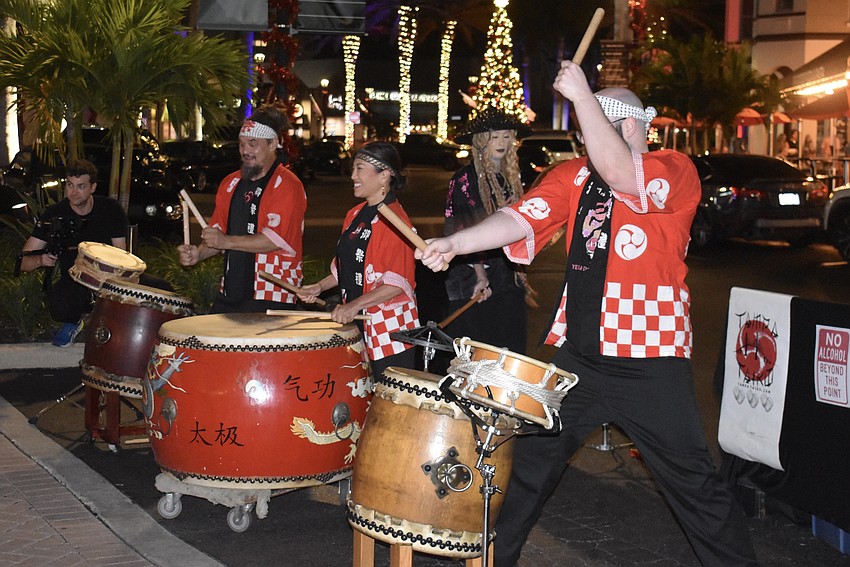 Tampa Taiko, a Japanese drum band, performs Nov. 20 for the grand opening of Kuro Sushi.